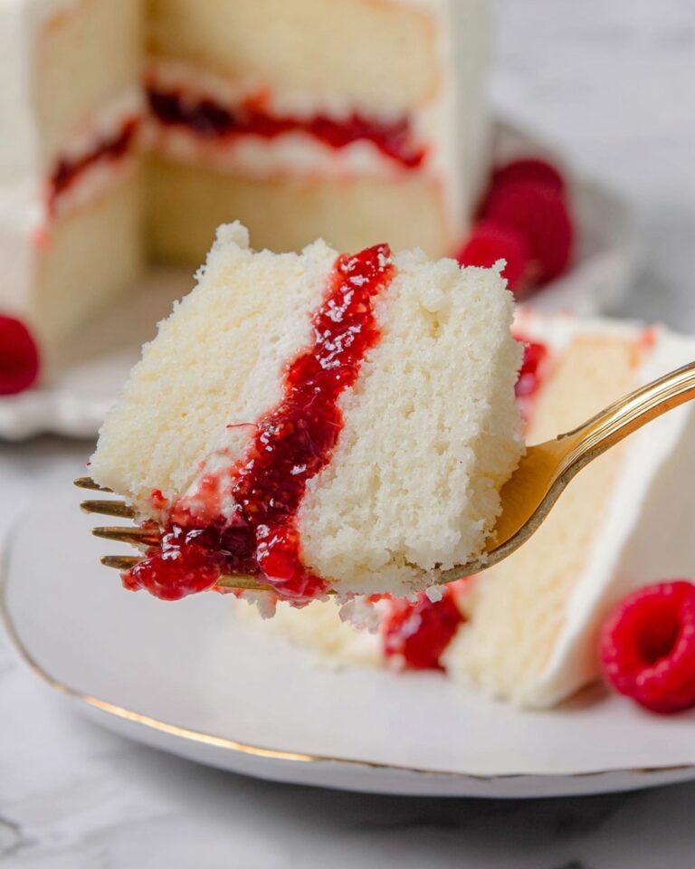 Strawberry Champagne Cake with Strawberry Buttercream and Edible Garnishes Recipe