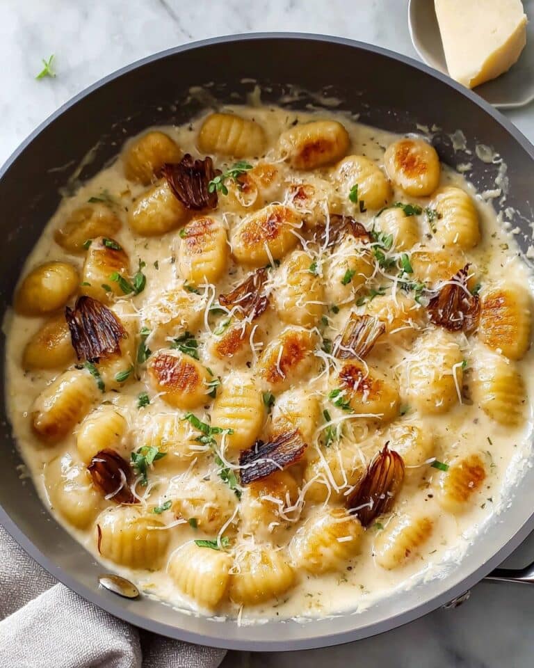 Buttery Gnocchi with Caramelized Onions, White Wine, and Gruyère Recipe
